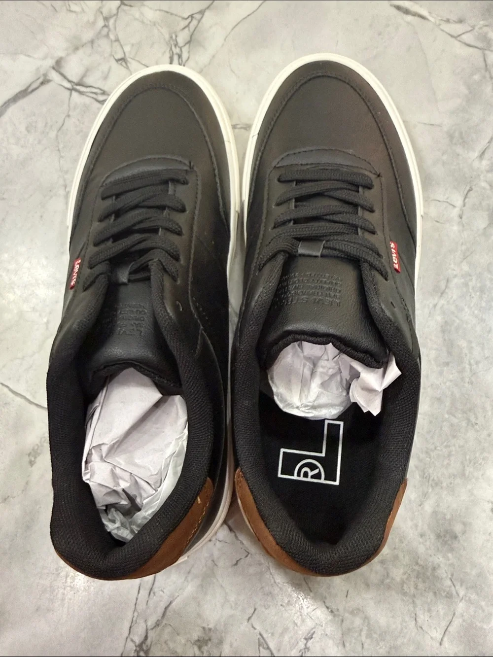 Levi's Men's Black Sneakers with Brown Heel Accent and White Sole